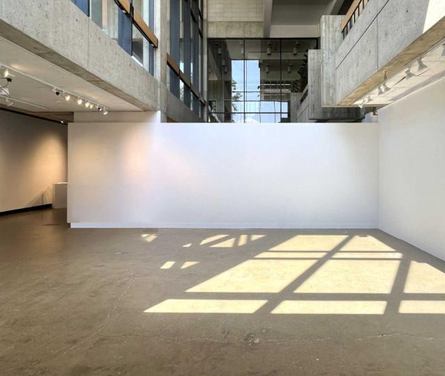 Interior view of the Hampshire College Art Gallery’s atrium and empty gallery.