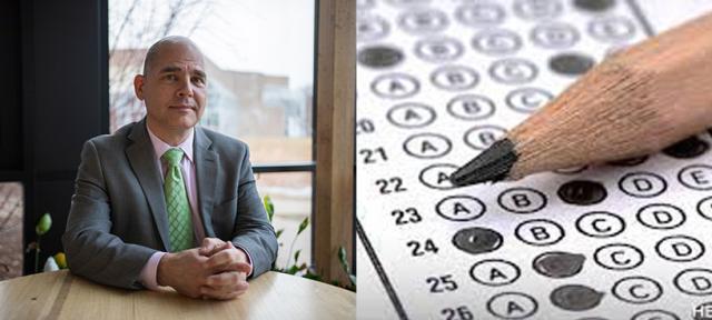 Hampshire College President Ed Wingenbach and a standardized test
