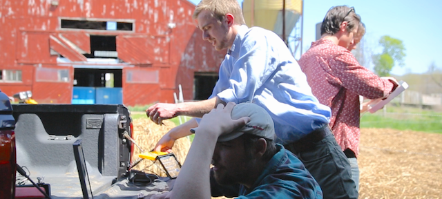 Hampshire College Student Josh Minot at work on his Agrigatr project