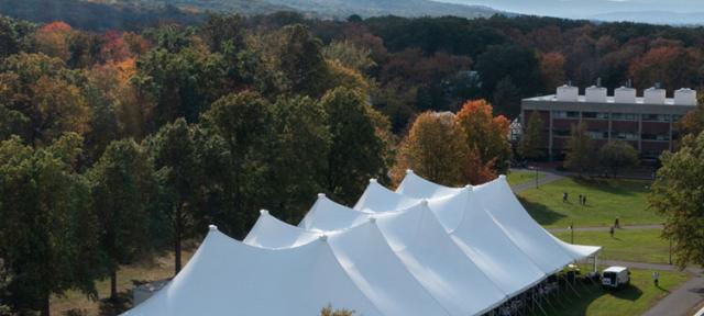 Aerial view of campus with giant white tent