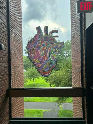 Illustration of heart on window