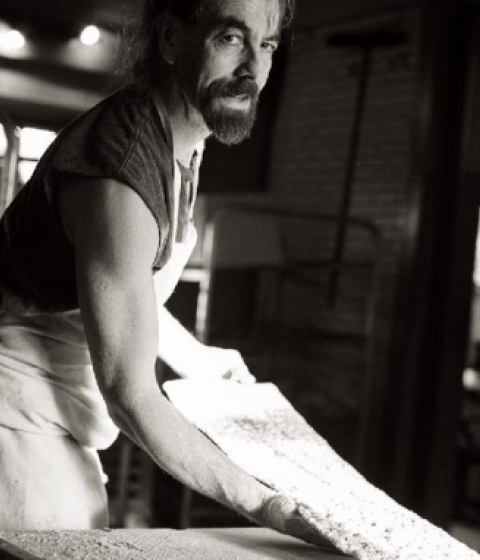 Left: Jonathan Stevens making bread Right: The cover of “The Hungry Ghost Bread Book”