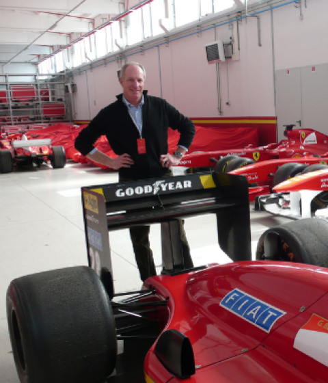 Left: Photo of David Wiener with Formula 1 cars. Right: Cover of ACCIDENTAL MADNESS