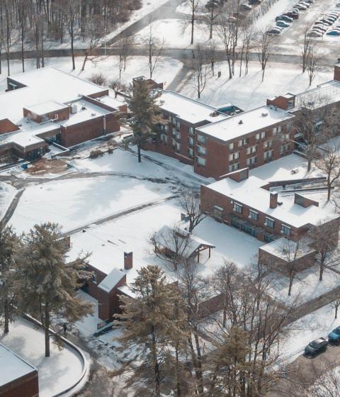 Campus buildings covered with snow as seen from above