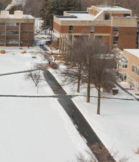 Center of Hampshire campus under a blanket of snow